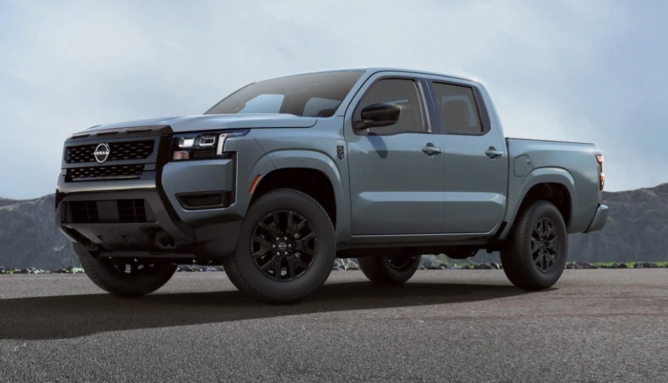 A light blue 2026 Nissan Frontier pickup truck
