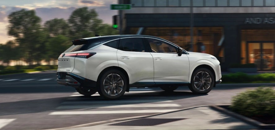 A white 2026 Nissan Murano SUV turning a corner